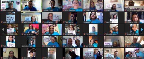 Zoom screenshot of smiling parent leaders and community organizers during Moms on a Mission, some are holding up rally signs