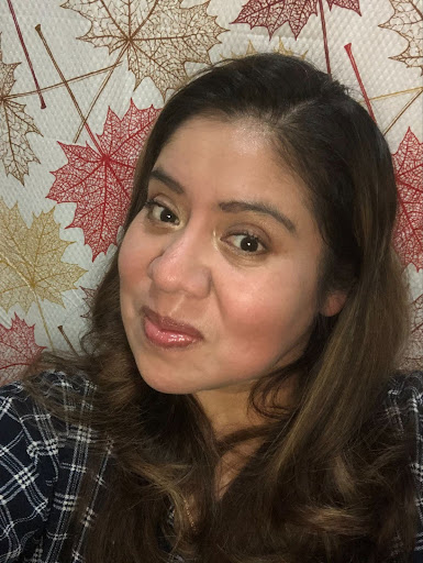 headshot of an Hispanic woman