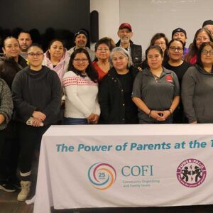 A group of about 29 adults standing for a group picture.